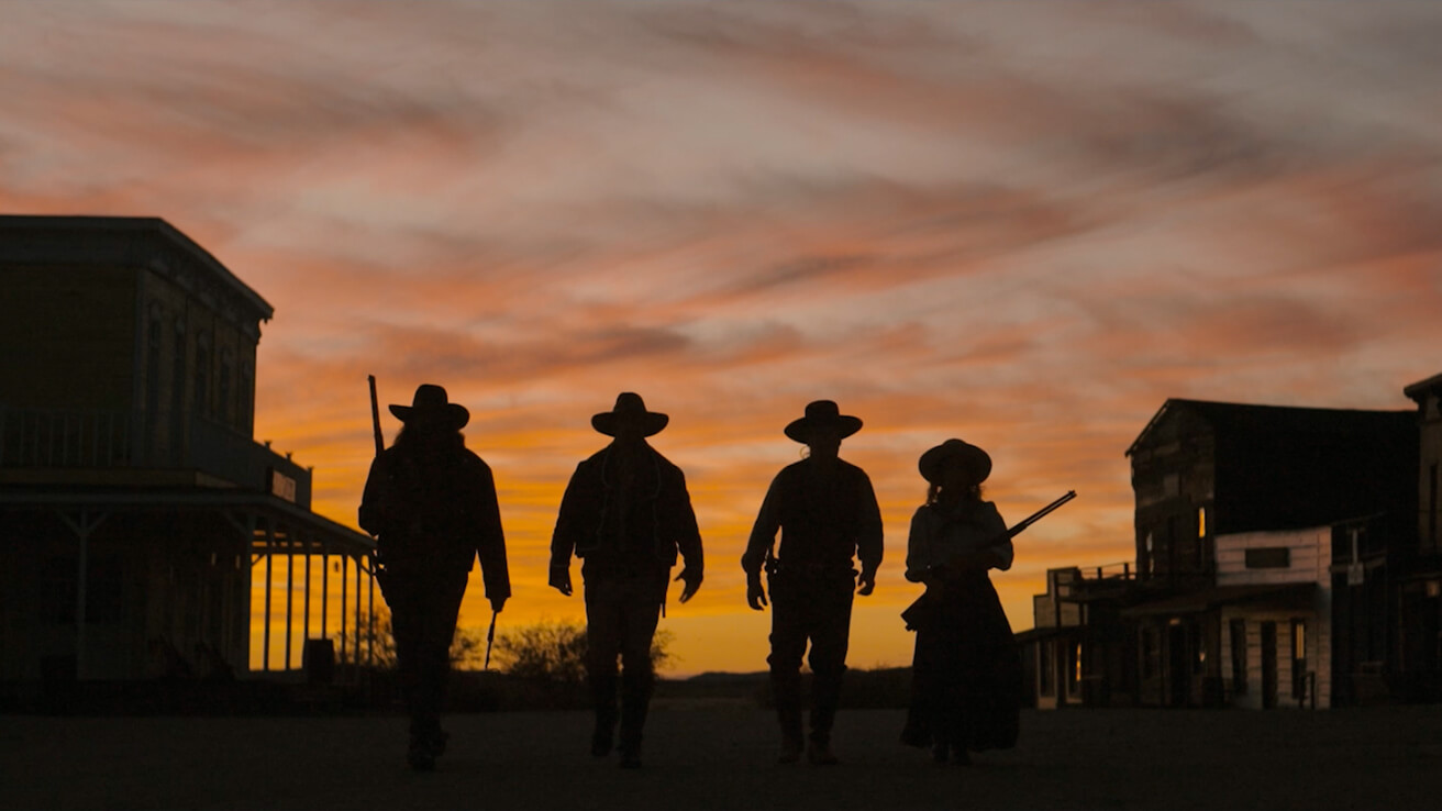 Cowboys in Sunset